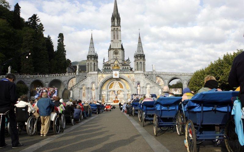 Page 13 Disabled pilgrims face the Basilica of the Rosary during a Mass for the sick celebrated by Benedict XVI in Lourdes in 2008 Brouwet announced the declaration during Mass at the shrine s