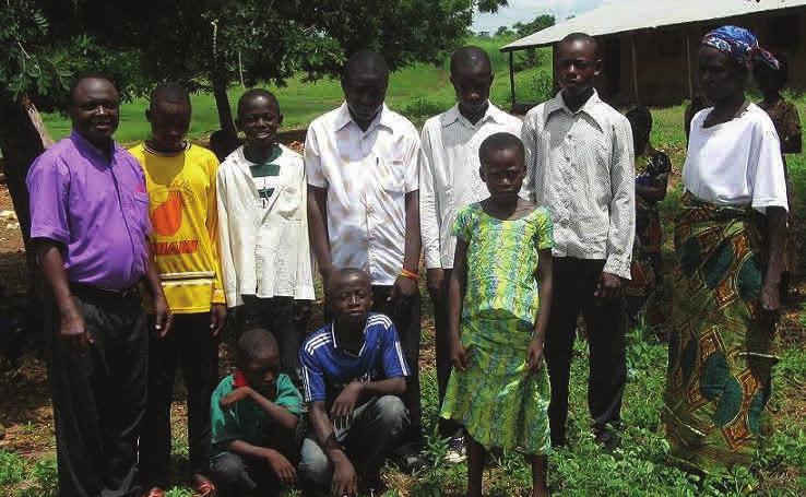 NEWS FROM ZIAKO The photo on the left shows the newest members of Ziako Congregation and Pastor Salifu.