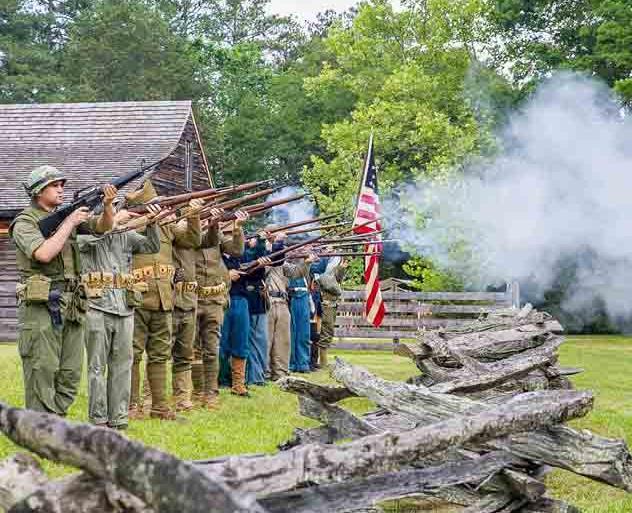 Gus Succop and outgoing President Dan Hopping Color Guard Memorial Weekend at Bennett Place NC Historic Site The society recently honored the fallen patriots of the Revolutionary War