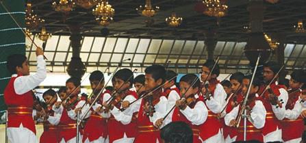 followed by an equally beautiful programme of instrumental devotional music presented by the students of Sri Sathya Sai Primary School, Prasanthi Nilayam on their violins.