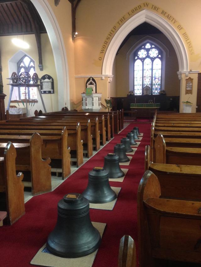 The eight bells of The Sam Maguire Community Bells laid out in the aisle of St Mary s Church,