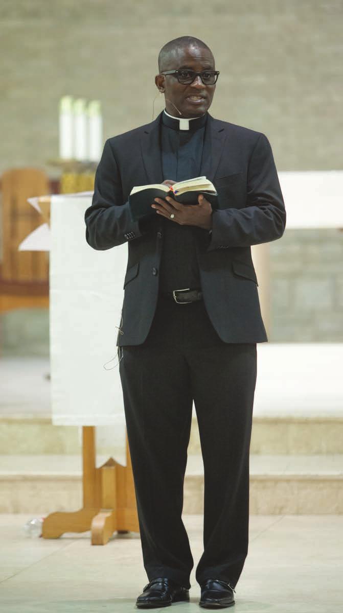 page 4 Fr. Jovita Okoli Reflects on Experience at For Fr. Jovita Okoli, the journey of faith began during his youth and bright and early in the morning, as his father would wake him at 5 a.m. for church.