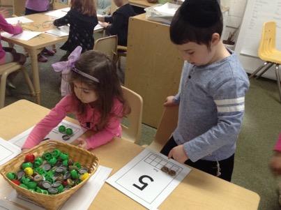 wide variety of materials. Today, we played a Purim matching game to review the mitzvot of Purim and the details of the story.