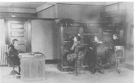 106 HISTORY OF JUAB COUNTY Telephone operators and personnel using equipment upstairs in the Pay Building, 48 North Main, Nephi, 1921.