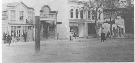 178 HISTORY OF JUAB COUNTY Westside of Main Street, Nephi, near turn of the century. The Courthouse is visible on the right.
