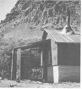50 HISTORY OF IUAB COUNTY Mining Structure, Joy. (Utah State Historical Society) molasses factory, a broom-making shop, a livery stable, and a blacksmith shop.