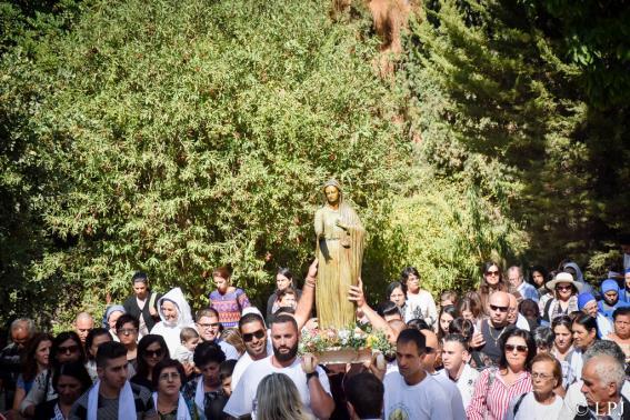The solemn Mass was followed by the traditional procession with the statue of Virgin Mary, Our Lady of Palestine.