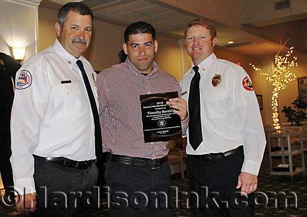 WFR Chief Lamar Stegall, 2016 Rookie Firefighter of the Year Timothy Berrios (center) and WFR Deputy Chief Lake Raymond.