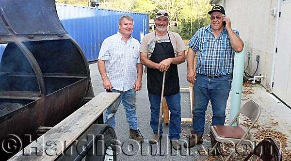 Readying the grill for the steaks are (from left) Michael Thompson, Duane Fugate and Gordon Banning.
