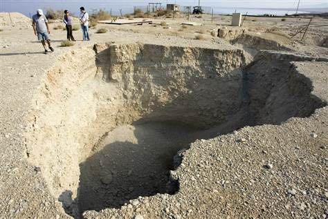Sink Holes along the Dead Sea Pits around the Dead Sea, in the Valley of Siddim Geologist Eli Raz spent 14 hours at the bottom of this sinkhole, after it opened up