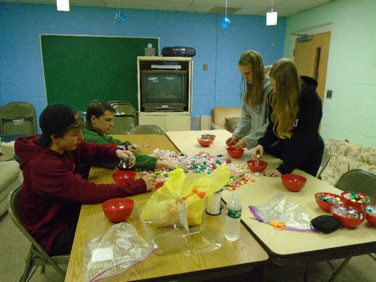 The Youth Group helped decorate the church sanctuary and hallways, leading our Deck the Halls