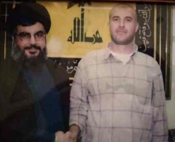 He is seen in an archive photo shaking hands with Hezbollah leader Hassan Nasrallah (Twitter, June 10, 2018).