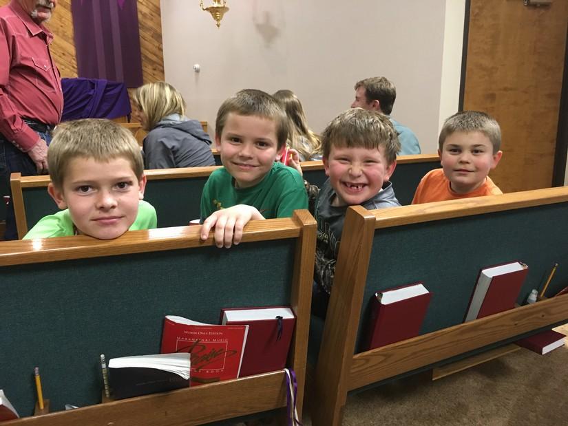 will be sending donations of money in Anna's name for chicks, pigs, goats, etc. to families served by Lutheran World Relief. Will, Michael, Fletcher and Hudsen enjoying Wednesday night service.