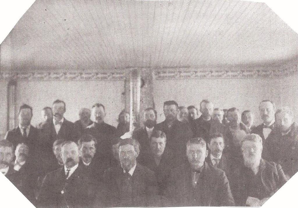 Picture of the men who organized Fridhem Evangelical Lutheran Church in 1903. (Celia Lindstrom gave this picture to Fridhem/Calvary church for its history folder.) the building.