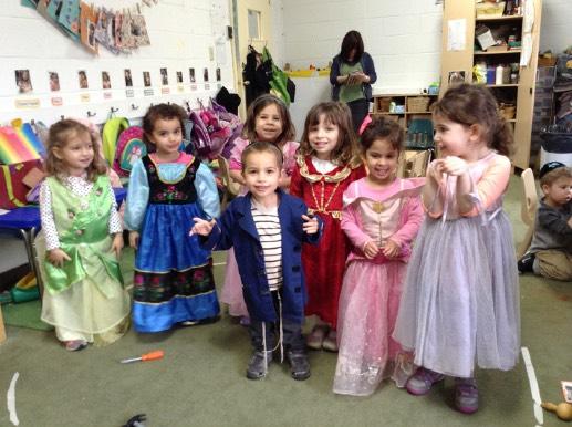 Top Right: We enjoyed singing and dancing to Purim sings with Morah
