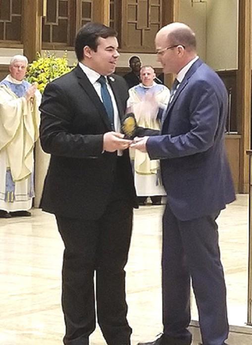 Holy Cross High School Man of the Year On May 31, 2018 Evan Katsefes was presented