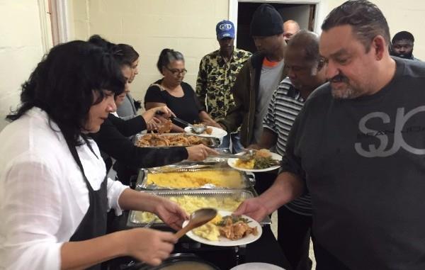 "Dozens of homeless enjoyed the meal and were also given a present containing a scarf, toothbrush, toothpaste,