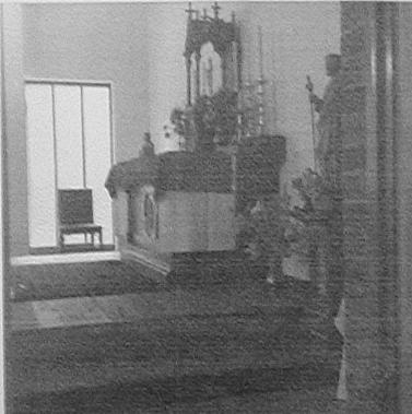 from the side showing the altar in the days when the priest celebrated Mass with his back to the congregation.