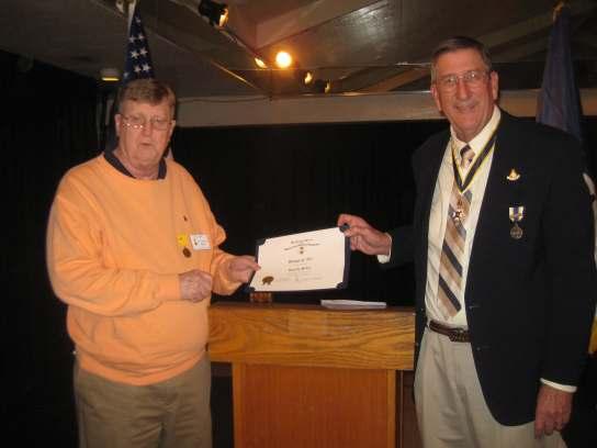 (L-R) Past President David Swanson presenting Rich Dahl with a certificate of appreciation Board of Managers meeting November 22, 2014 By David Swanson During the November 22, 2014, Board of Managers