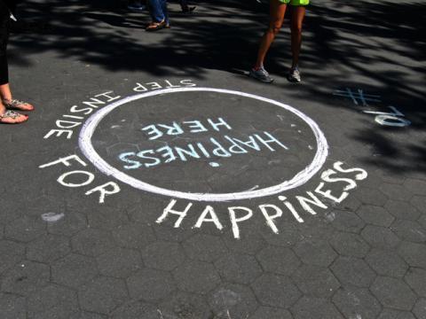 Happiness Here! This video features the "Happiness Here" street art. On this particular day the artist placed seven "Happiness Here" spaces in Washington Square Park.