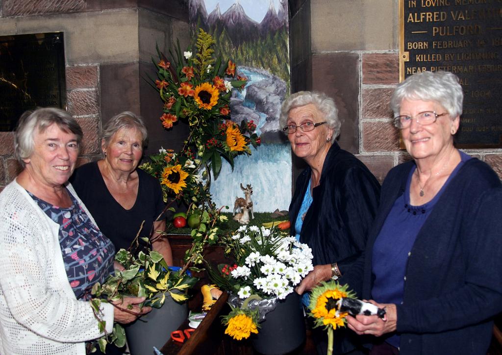 2 The St Mary s-greyfriars team working on the All Things Bright and Beautiful display in the Grand Flower Festival to mark 150 years of worship in St John s Episcopal Church in Dumfries recently.