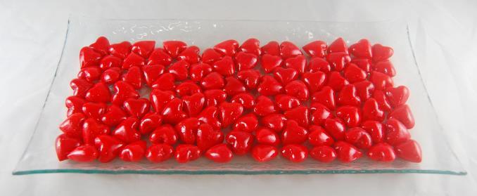 Red Glass Pocket Hearts Red glass hearts measure approx. 1 x 1 x 3/4.