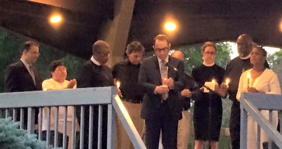 Interfaith Clergy and community leaders gathered in Lyon park (below) for a vigil remembering those killed in Charleston at Emanuel AME Church. Pastor Jim behind Rabbi Gropper of Rye.