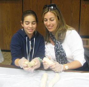 The program included singing, artwork, a puppet show and a Shabbat game show.