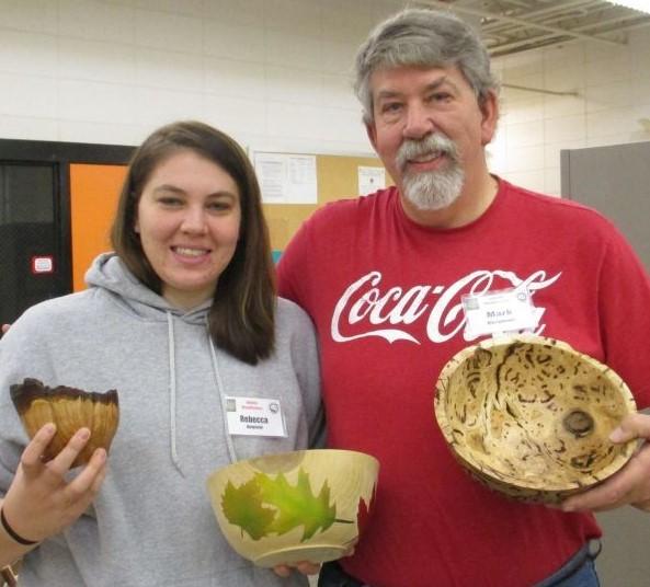 Becca Kielpinski had various bowls, the Dale Larson bowl made out of Maple, a Honey Locust natural edge bowl, a Big Leaf Maple burl bowl and a Christmas ornament made out of Cherry and Walnut.