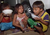 street children and other neglected children with a warm meal and