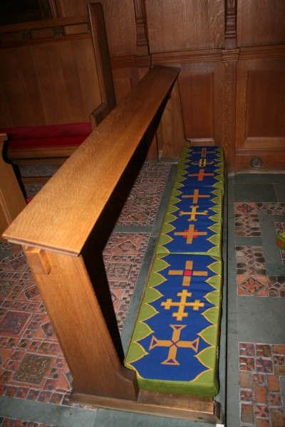 This is one of the kneelers at the altar rail where you can receive communion. Choir People who serve the church through sung prayer and sit in the choir stalls.