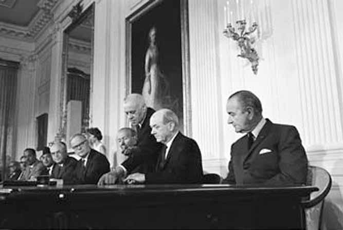 Lyndon B. Johnson Presidential Library U.S. Secretary of State Dean Rusk signs the Nuclear Non- Proliferation Treaty (NPT), July 1, 1968, while President Lyndon Johnson looks on.