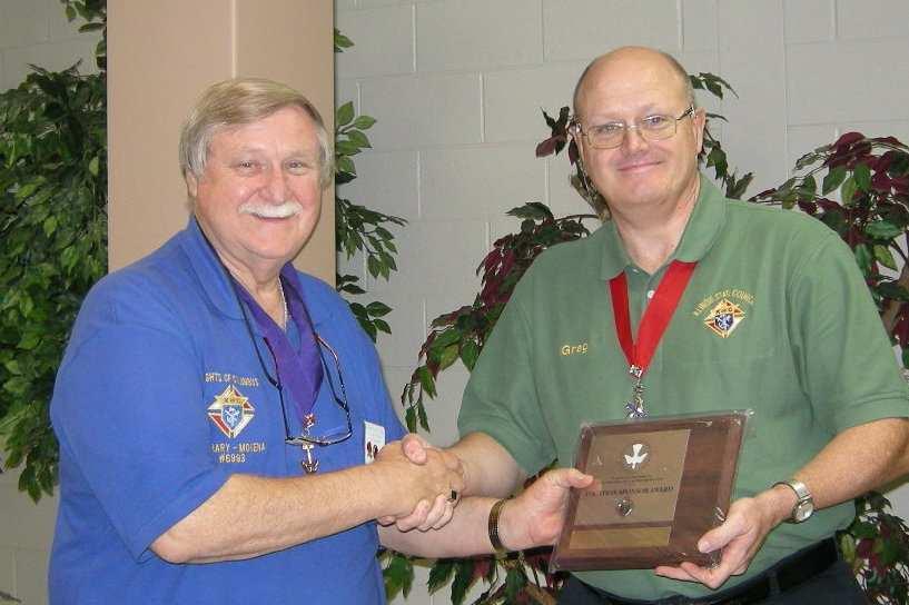 MORE COUNCIL AWARDS! District Deputy Greg Quinn presented Grand Knight Don Bauc with two awards at the October meeting.