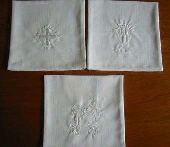 Corporal A linen cloth that is put on the altar, over the altar