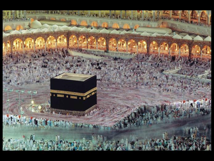 The Kaaba, Mecca Symbolic center of the Islamic world - - at the time of Al-Amin s conversion, worship to God was centered - around a shrine in Mecca at the sacred site of the Ka'bah - - A cubical