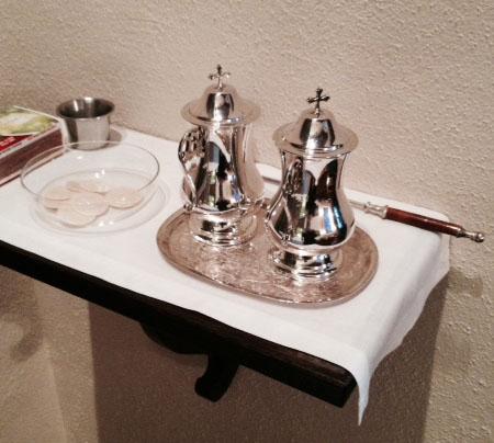 Light two altar candles five minutes before the service. Credence Table 1. Place the two glass cruets, glass bowl with small wafers on the shelf to the right of the altar. Cleanup 1.