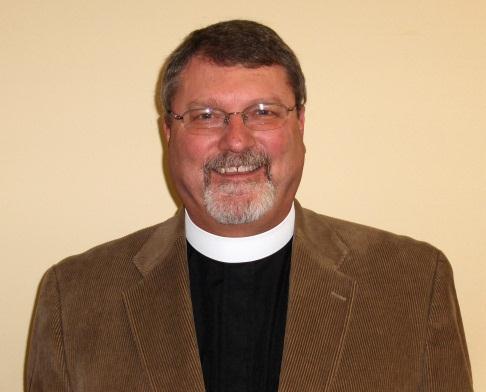 Who Does What? The Priest-in-Charge The Reverend Canon Dr. Mark Gatza has been Emmanuel s priest since July, 2009.