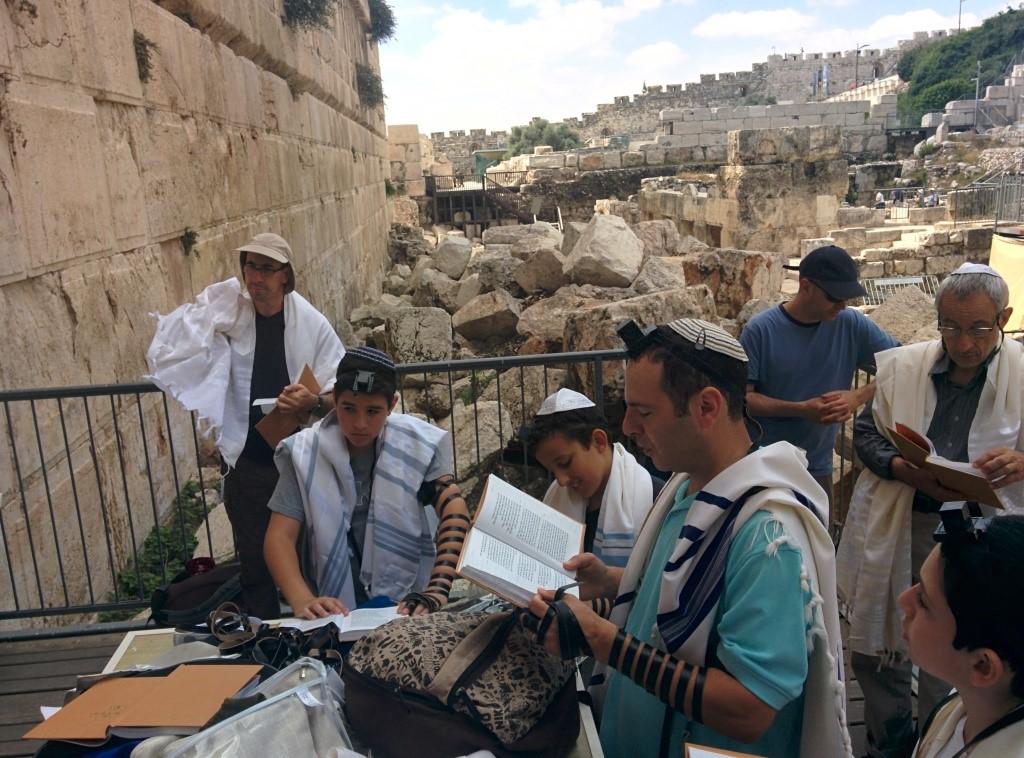 on Tefillin & Talit while praying at Robinson s Arch (also known as Ezrat Israel).
