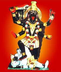 Kali wife of Shiva black in color & wearing a necklace of skulls.