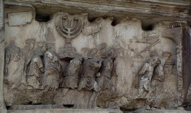 Relief depicting a triumphal procession into Rome with loot from the temple, including the menorah, panel in the passageway, Arch of Titus, Rome, c. 81 C.E.
