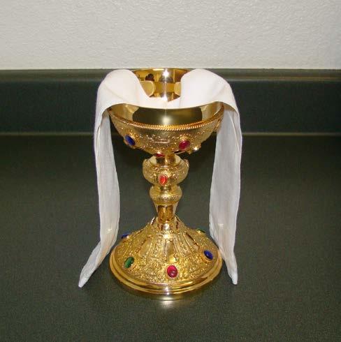 Preparation of the Celebrant Chalice 1. Place the purificator over the chalice 2.