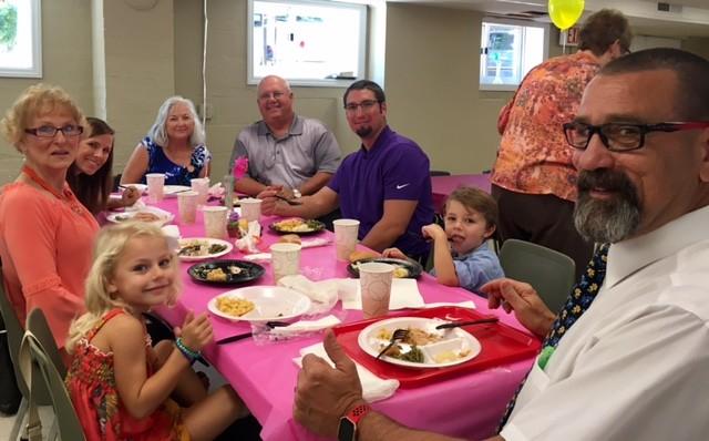 Lucas and Brooklyn Petty enjoying lunch with their grandparents.
