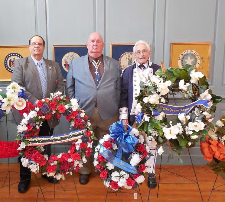 . Left to right, Associates Doug Graves, Jerry Hubbard and Mike Lyman displaying their wreaths.
