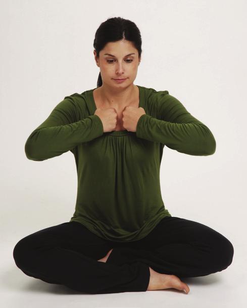 High-Heart Tapping Tap on the area below your neck and above your midchest using your fingertips, fist, or open hand.