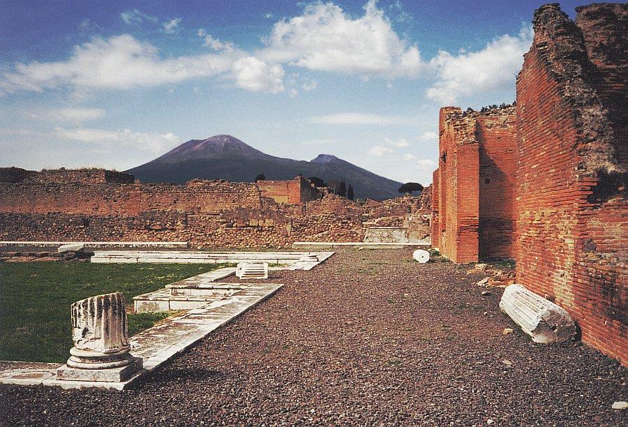 3. Look at the landscape around Vesuvius, using the resource provided for this question (part 1, question 3). Mt. Vesuvius viewed from the ruins of Pompeii. a. Is it hilly, mountainous, flat, or a combination of the above?