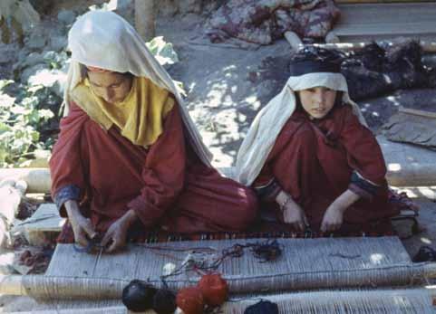 How to Make A Rug An Afghan woman and young girl work together to weave an oriental rug (Qala Nau, Afghanistan, July 1972).