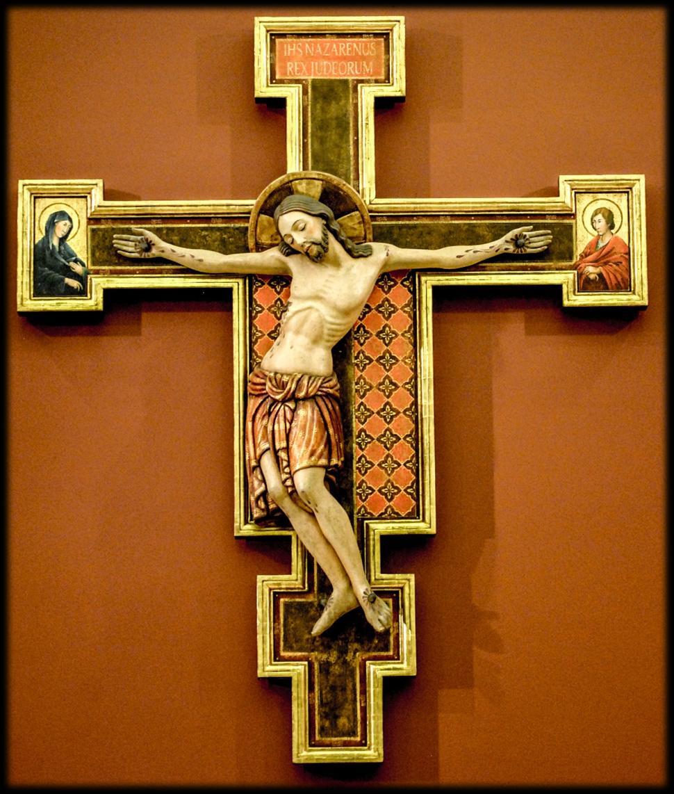 On entering our Church, one s eyes are drawn to the large Crucifix opposite the main entrance aisle. A Crucifix is a Cross with an image of the crucified Christ.