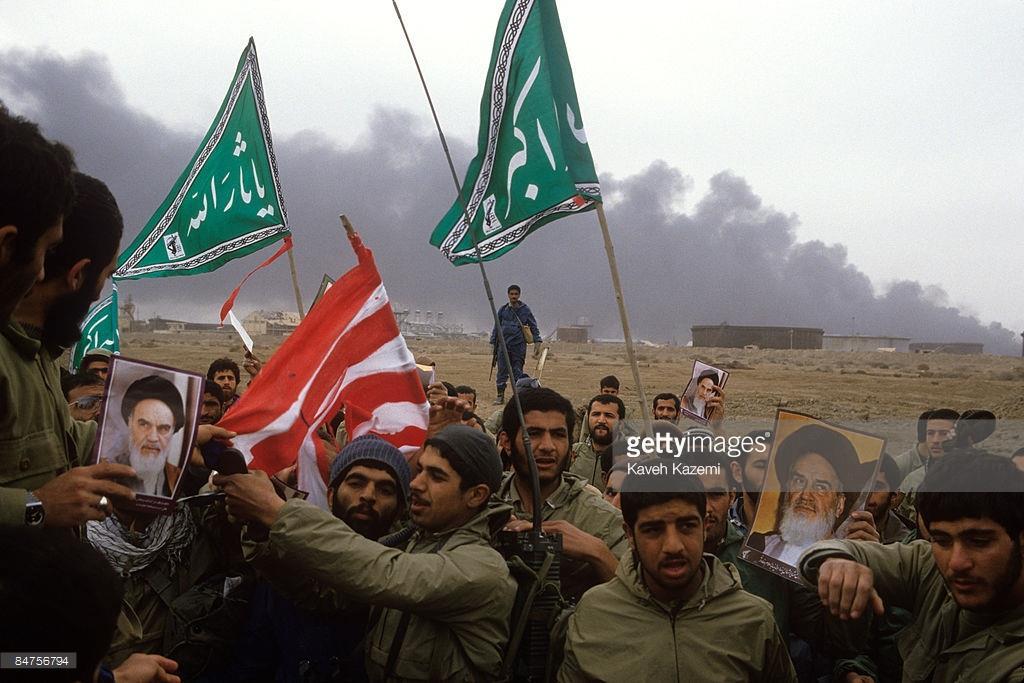 Foreign involvement Iran's Revolutionary Guards prepare to burn an American flag on the al- Fao Peninsula