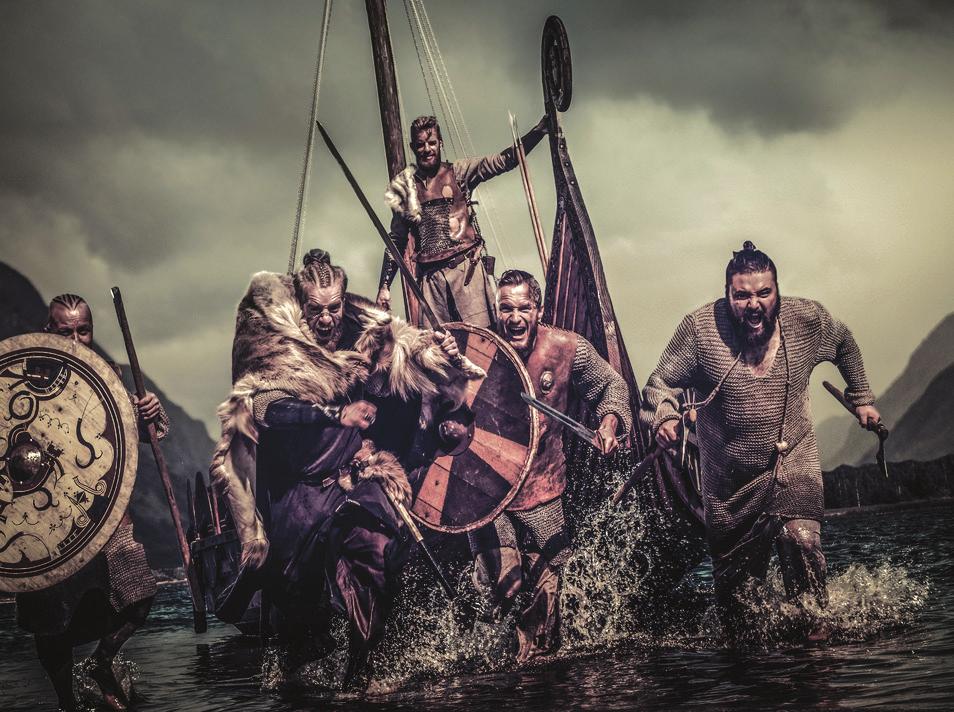 Before Reading Think Ahead Look at the picture and answer the questions Vikings ship charging ax sword 1 What do people sail in to reach different places?