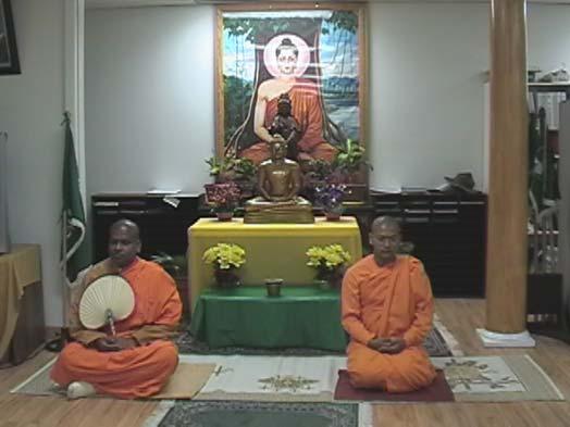 Seewalie and Ven. Visvakirti conducting a meditation session for the devotees.